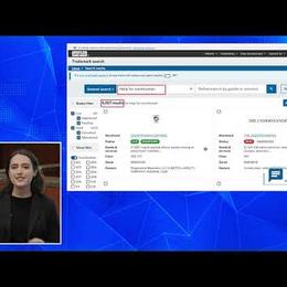 Video still of a presenter speaking beside a screen showing a USPTO trademark search results page.